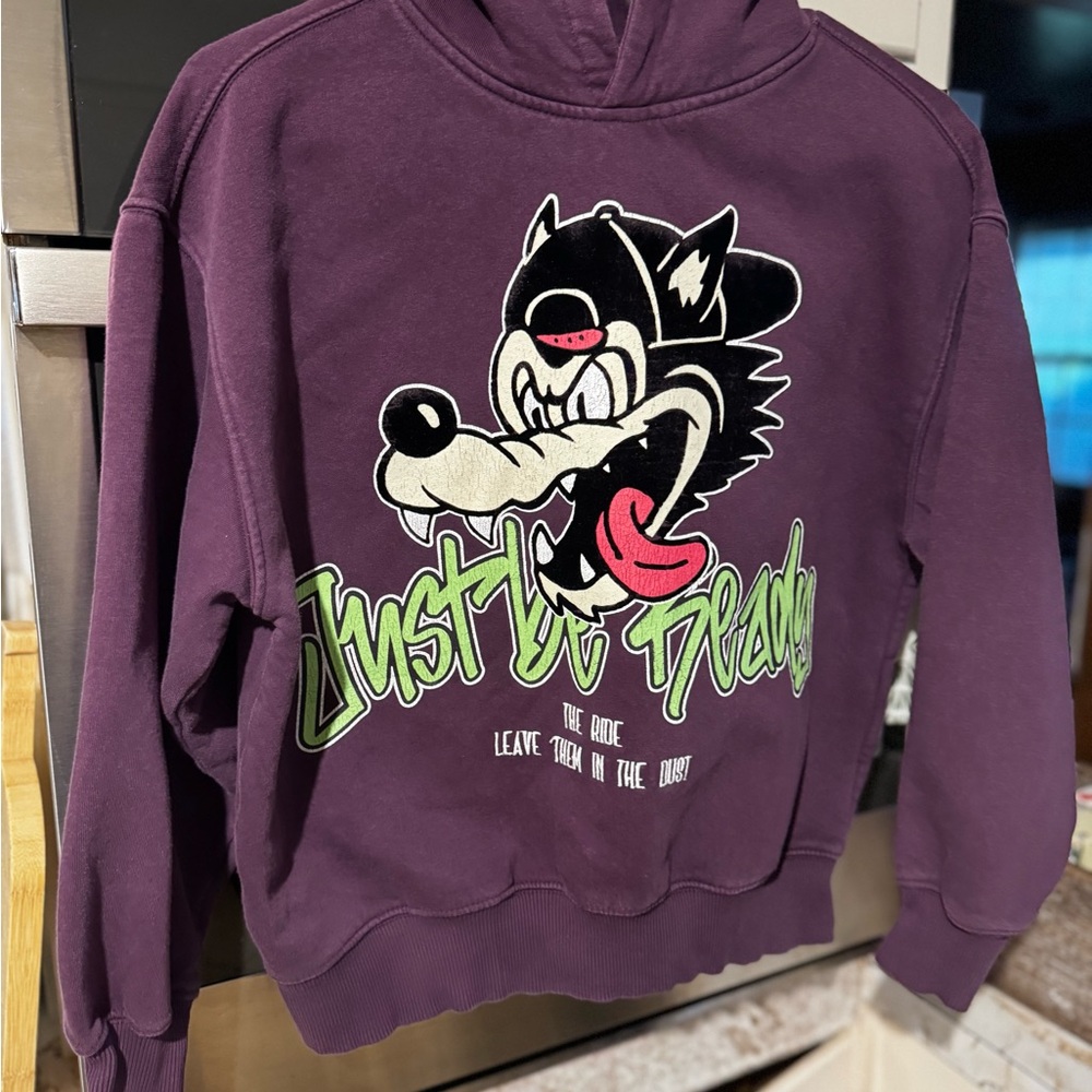Purple Hoodie with Cartoon Graphic